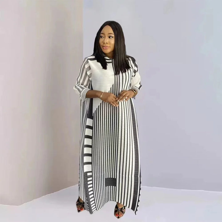 Unleash Your Inner Elegance: Miyake Pleated Stripe Dress for Spring Parties