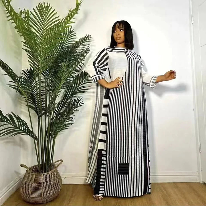 Unleash Your Inner Elegance: Miyake Pleated Stripe Dress for Spring Parties