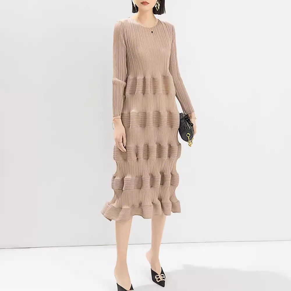 Upgrade Your Spring Wardrobe with Miyake's Latest Pleated Dress - Now Available in All Sizes!