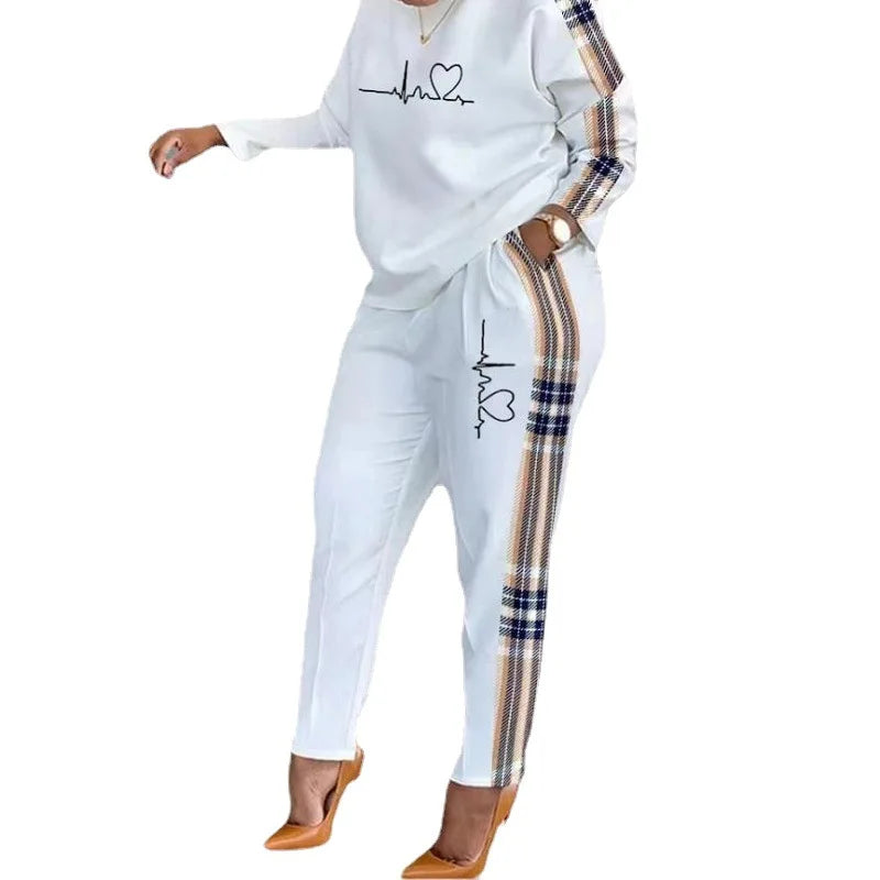 Stay Warm and Stylish this Winter with our Woman's Tracksuit Set - Perfect for Jogging and Sports!